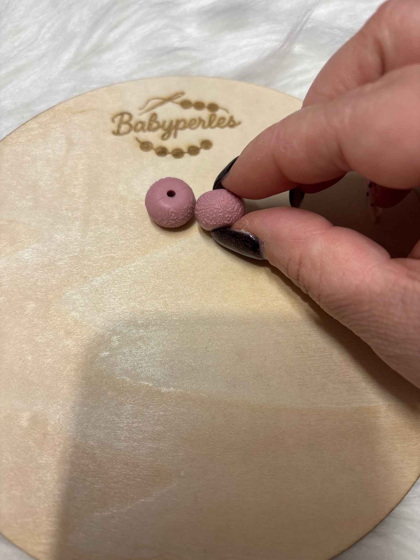 Perles embossé
