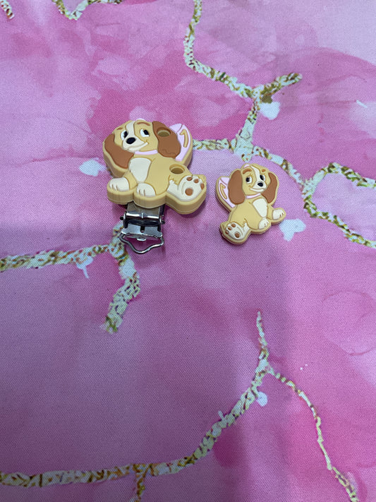 Attache tétine belle et le clochard