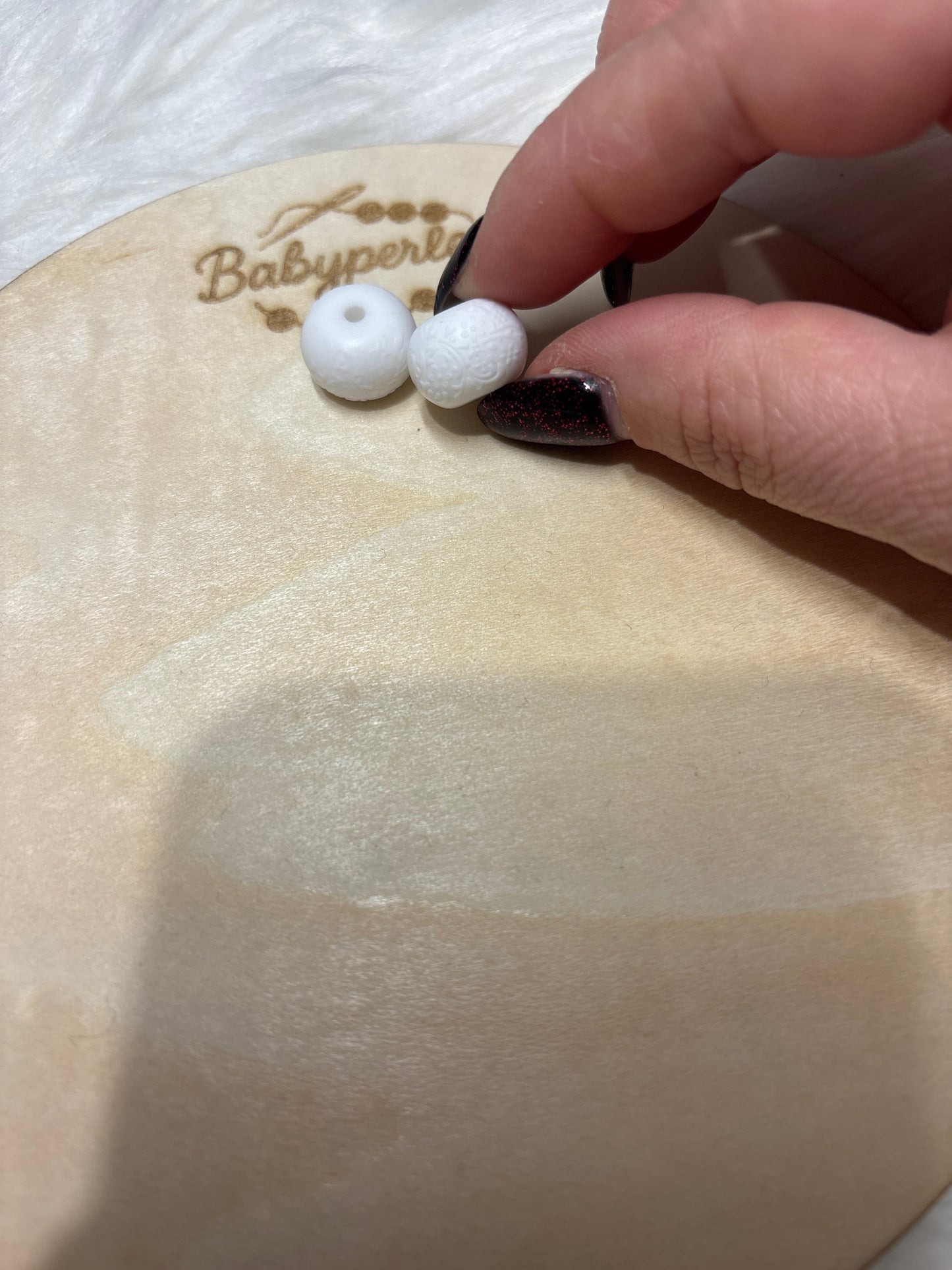 Perles embossé