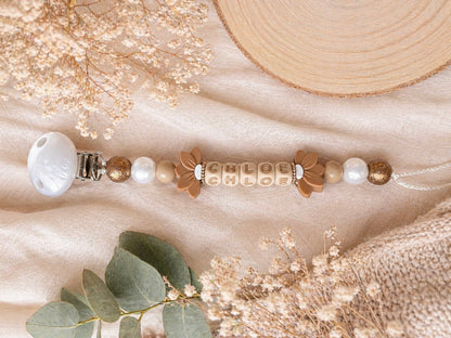 Attache tétine double fleur de lys