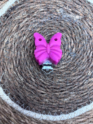 Clip papillon fushia pailleté