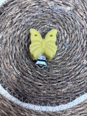 Clip papillon moutarde pailleté