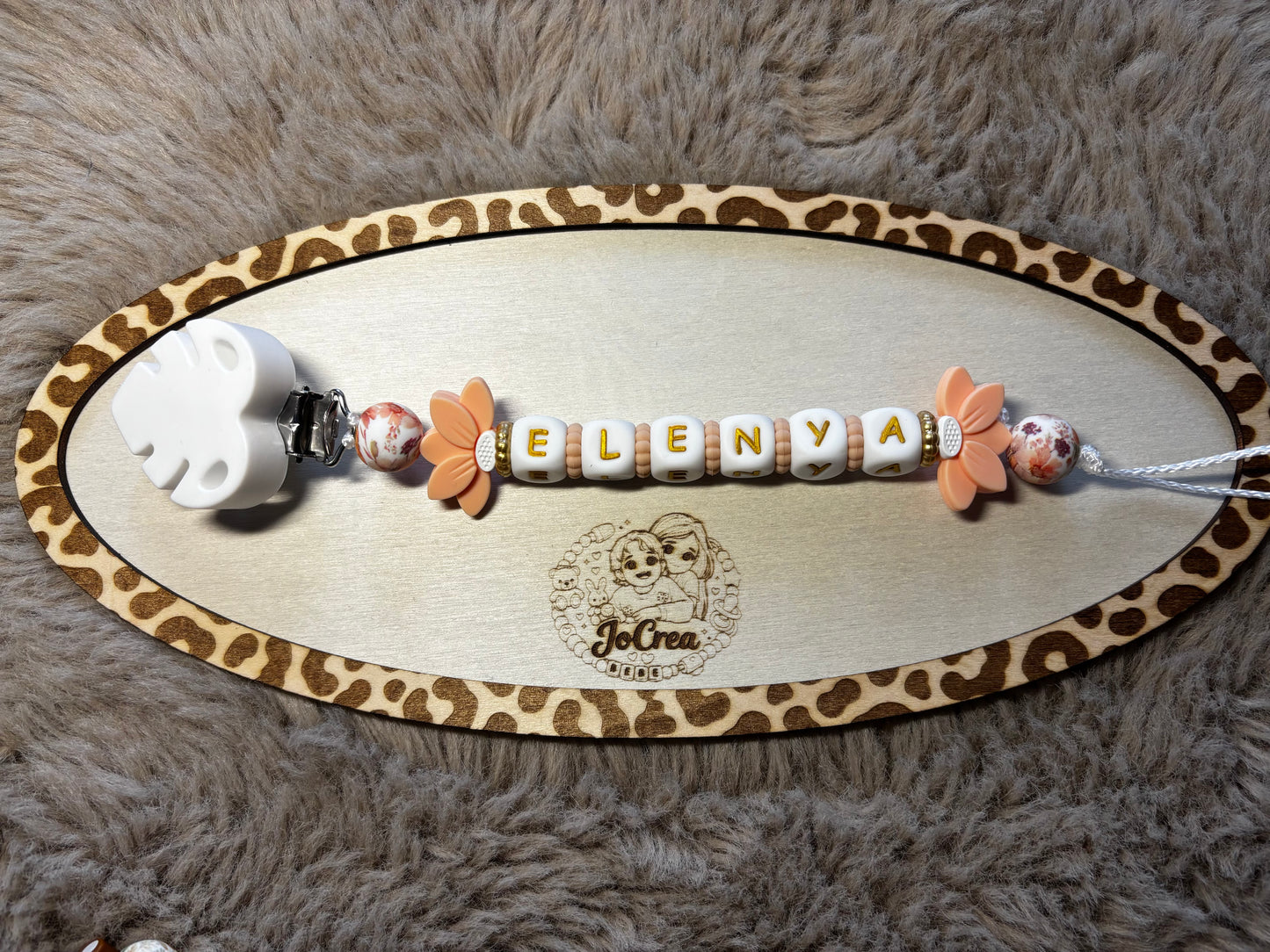 Attache tétine double fleur de lys
