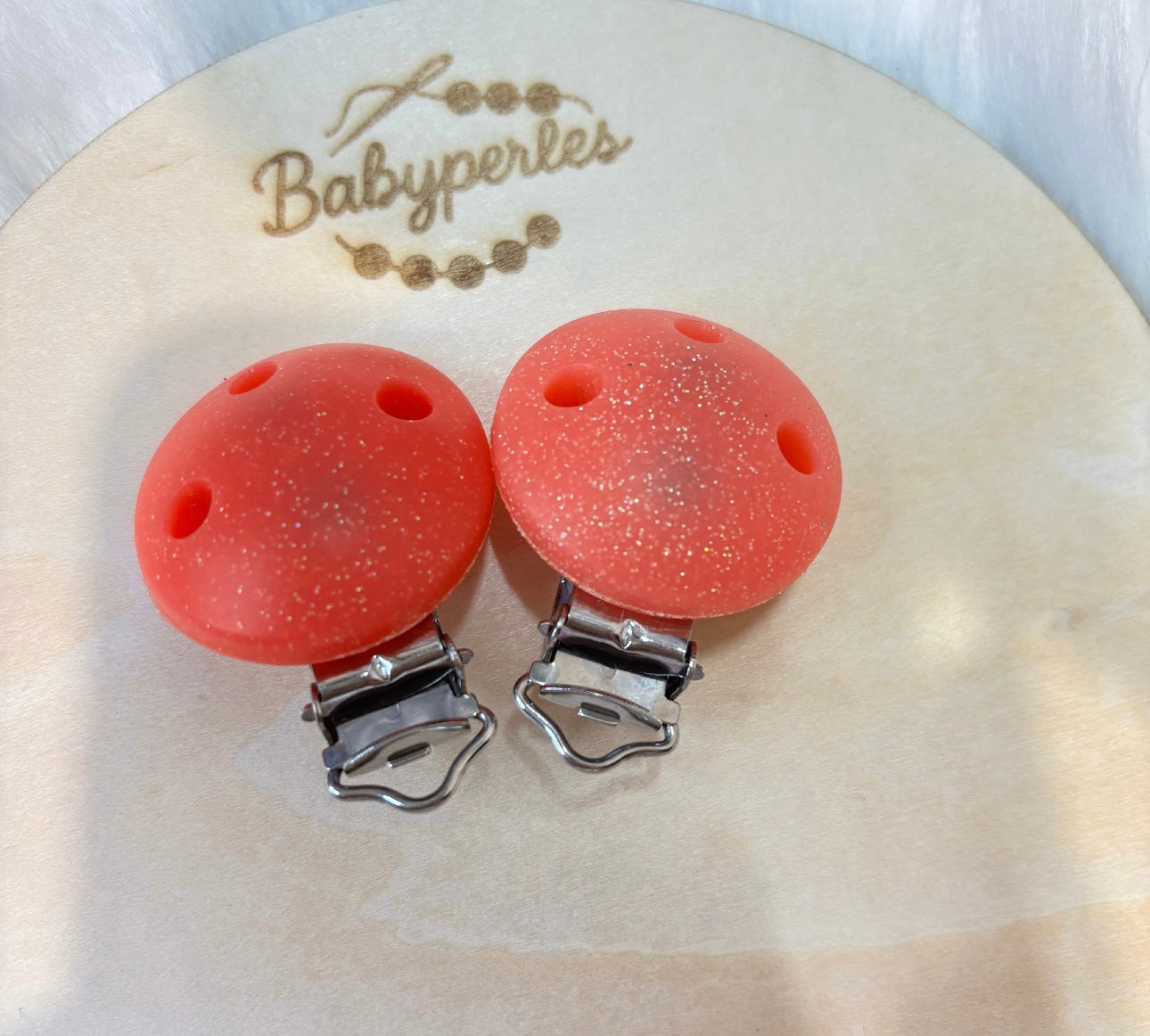 Clip corail bouge pailletée