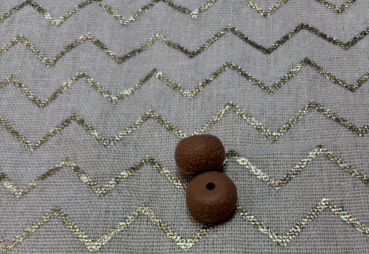 Perles embossé