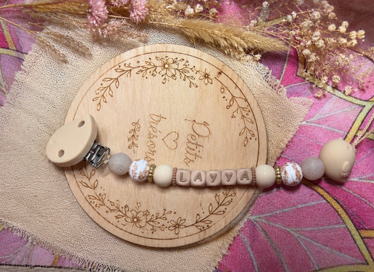Attache tétine oiseau beige en 3D