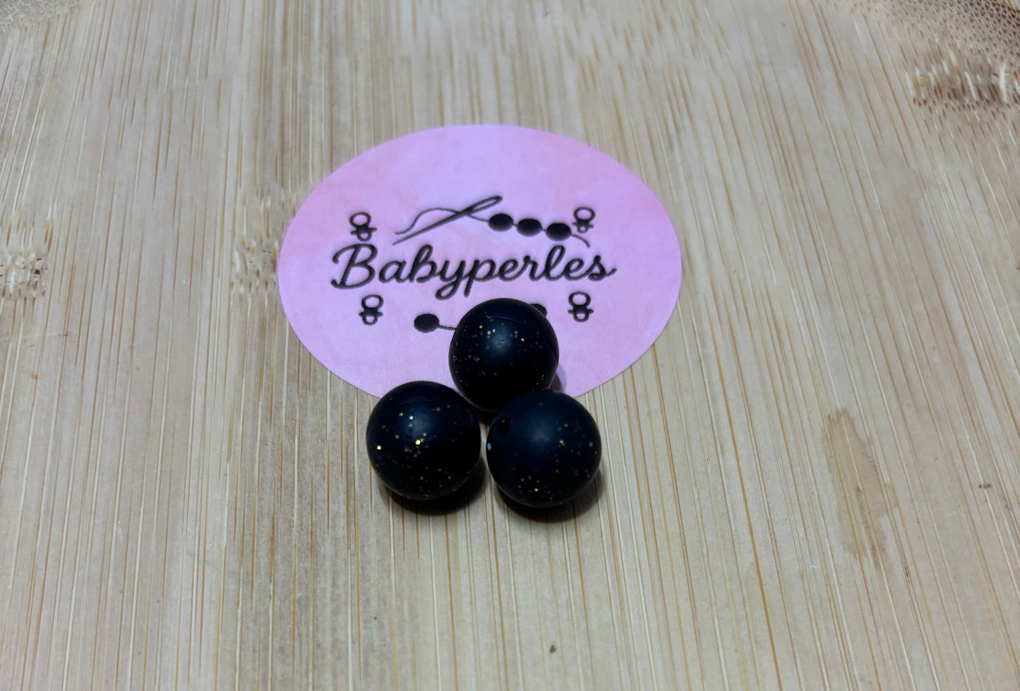 Perle 12 mm noir pailletée
