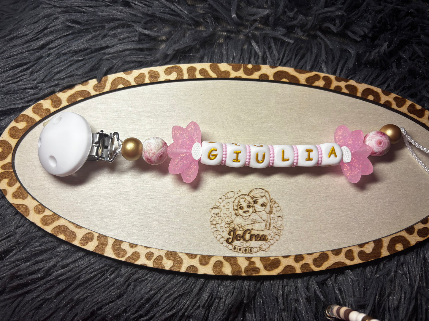 Attache tétine fleur de lys pailleté
