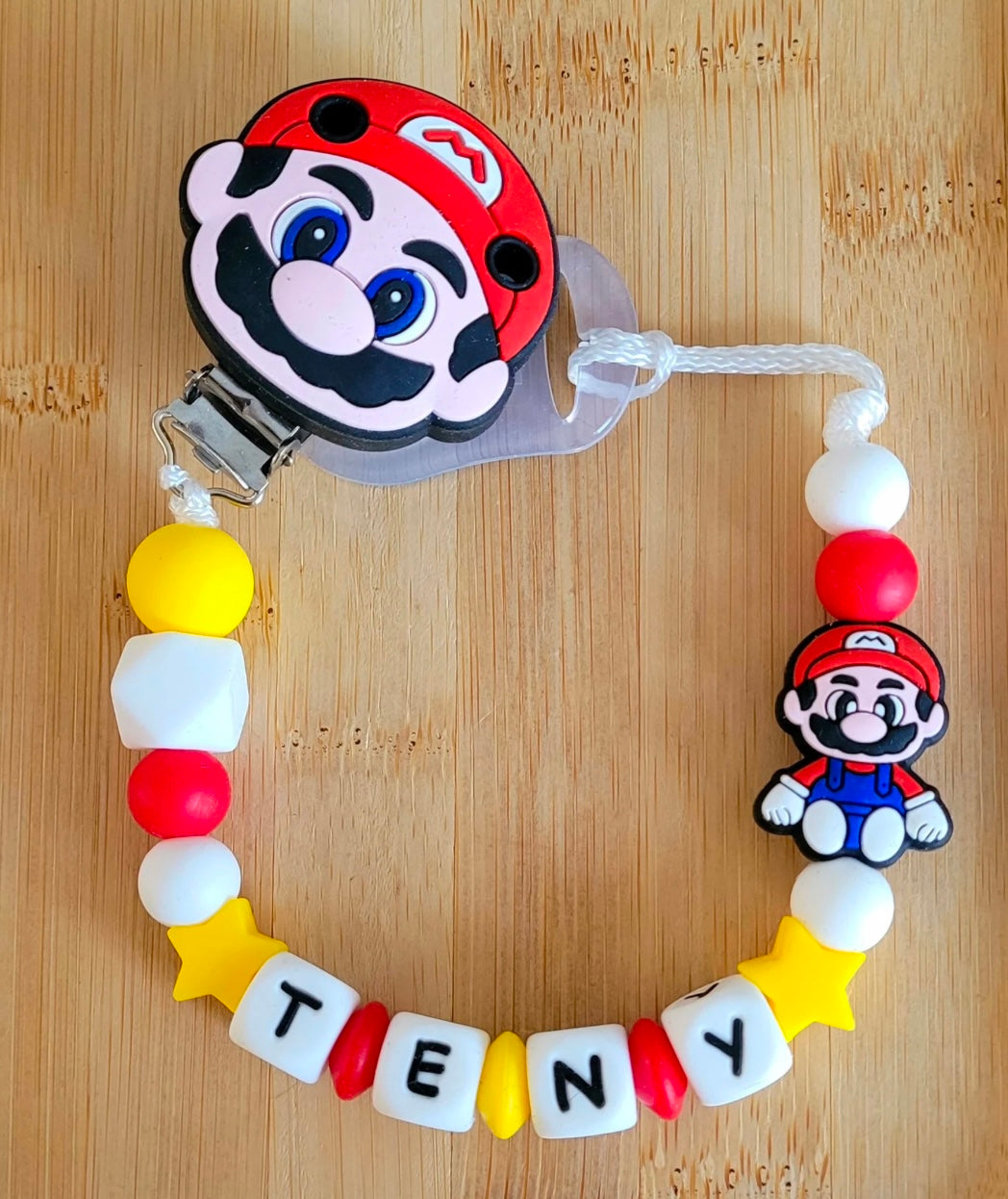 Attache tétine Mario