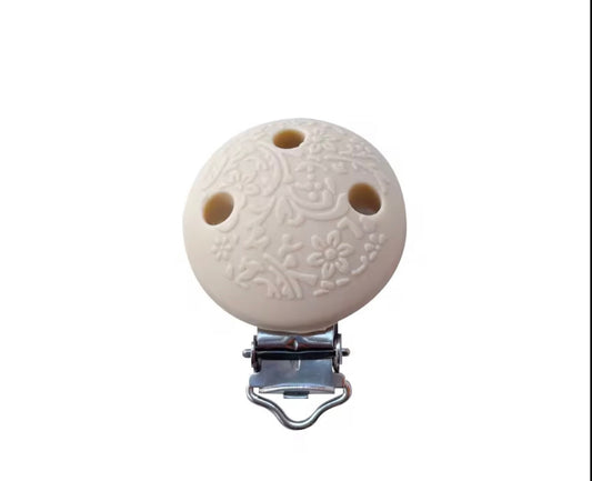 Clip embossé beige