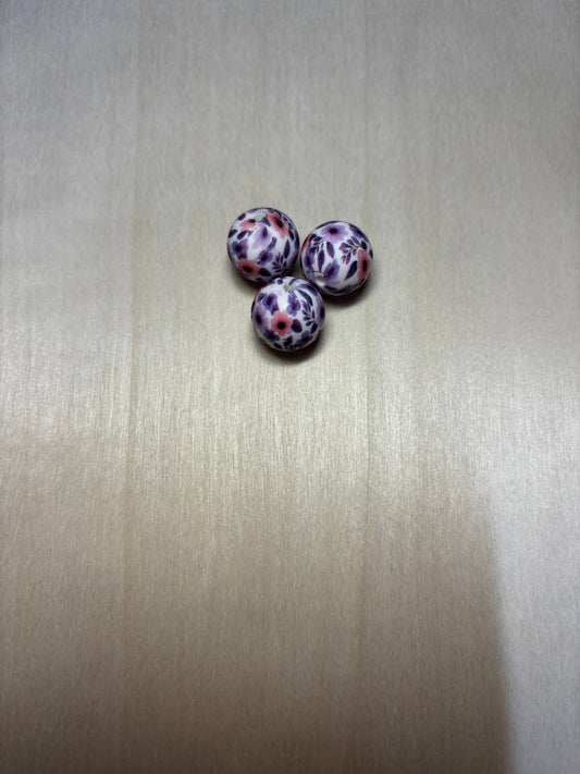 Perles fleuris violette 15 mm